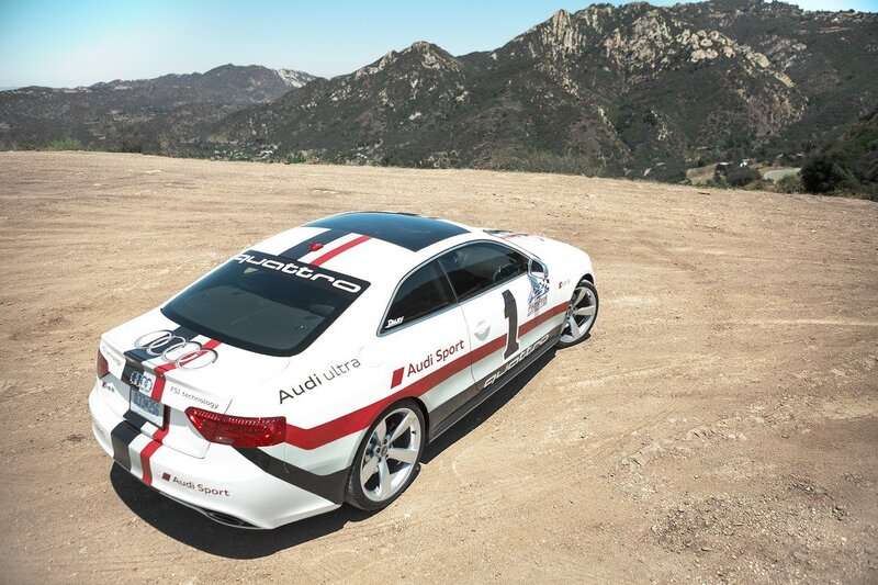Audi race car on a dirt field