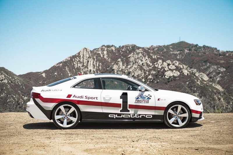 Audi race car on a dirt road