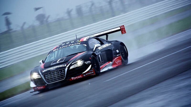 Audi race car on a wet track