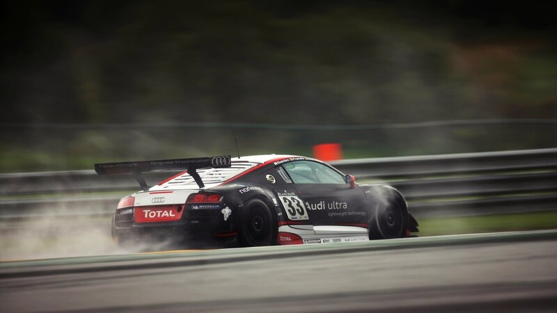 Audi race car on a wet track