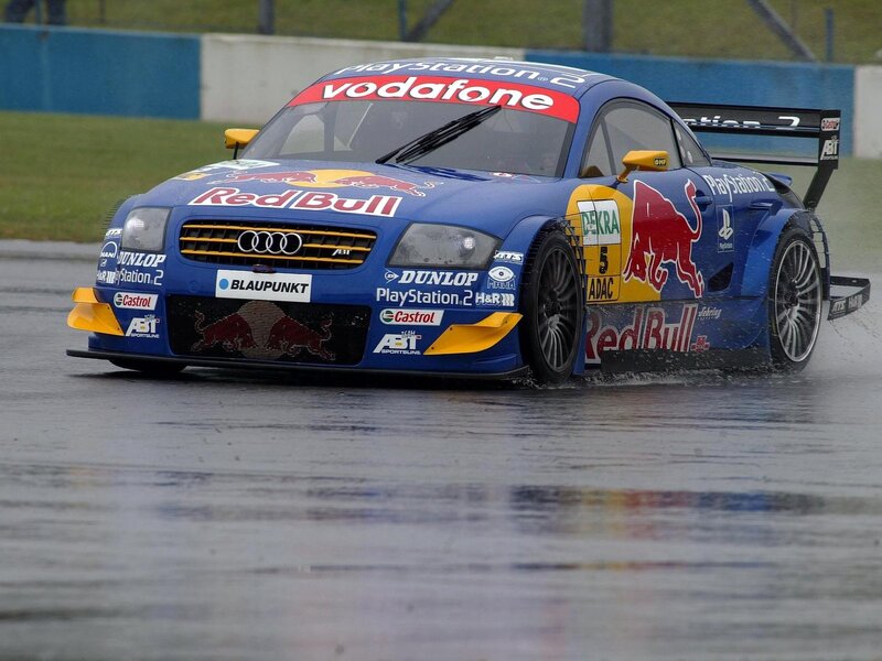Audi race car on a wet track