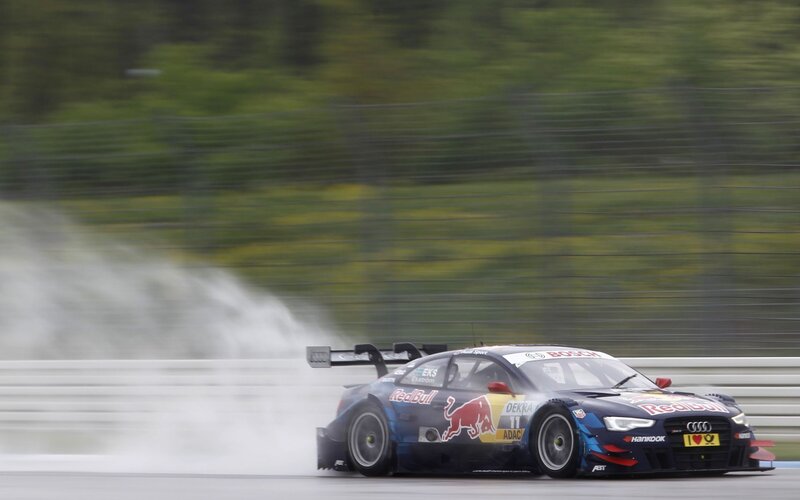 Audi race car on a wet track