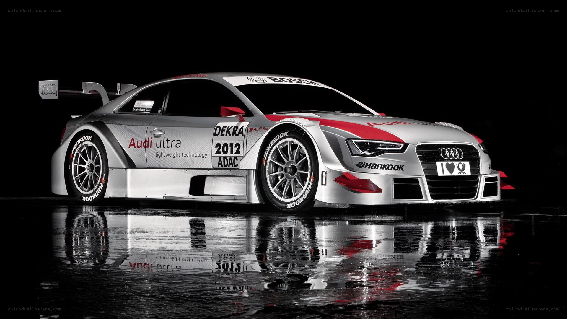 Audi race car on wet surface