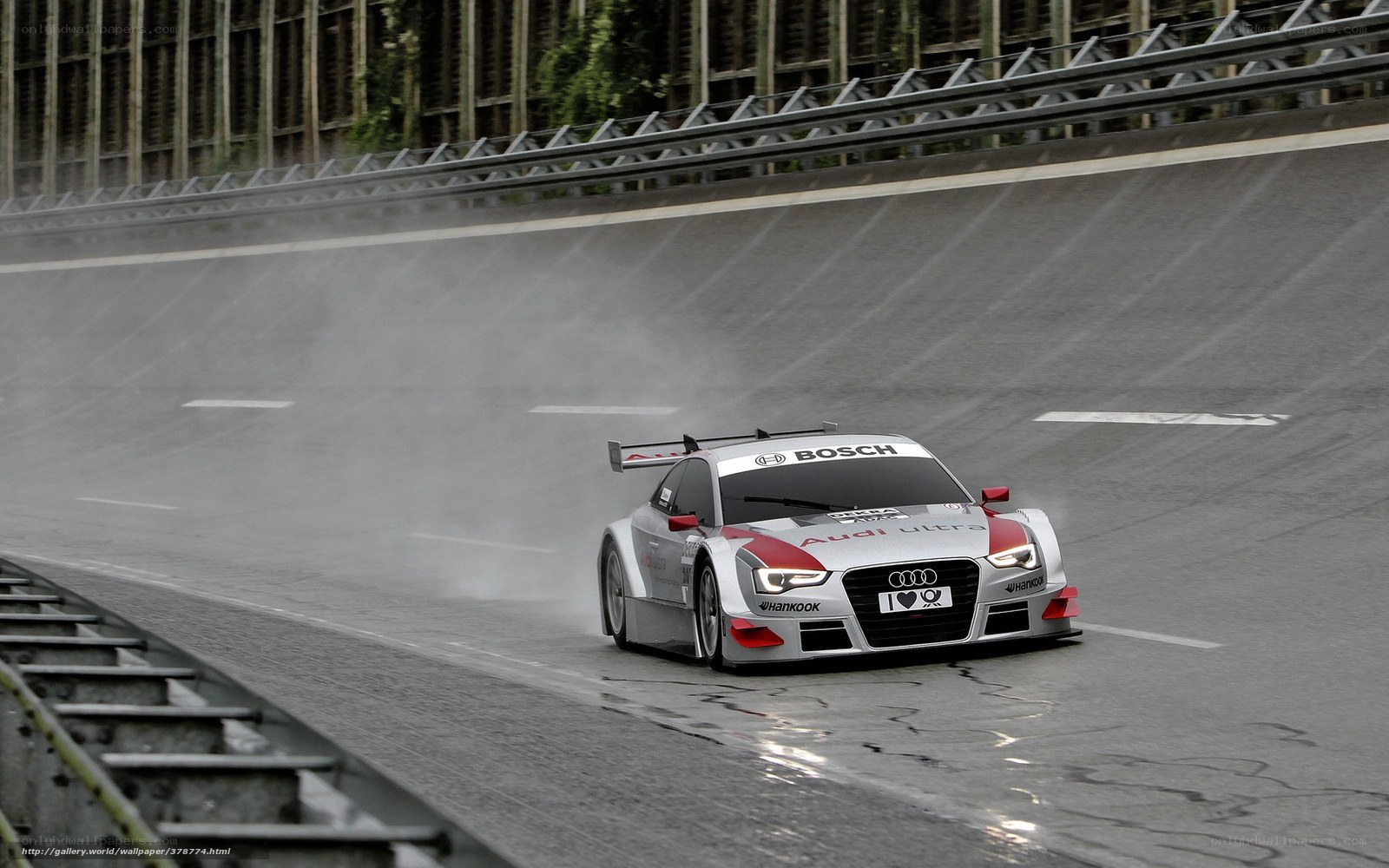 Audi race car on wet track