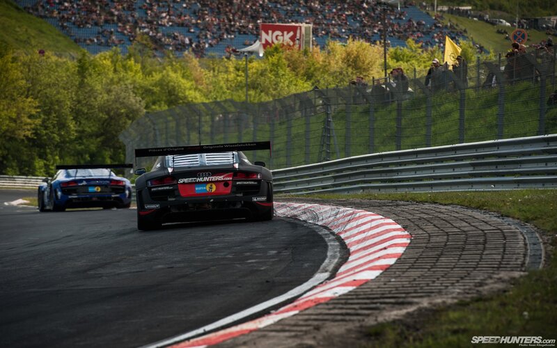 Audi race cars on a track