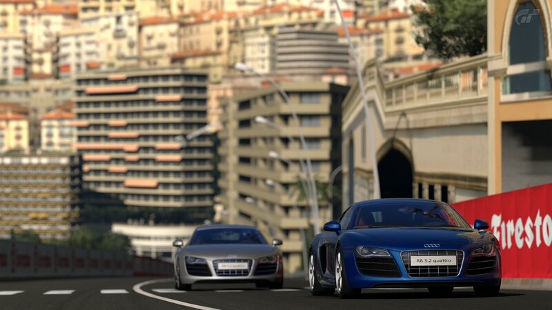 Audi race cars on city track