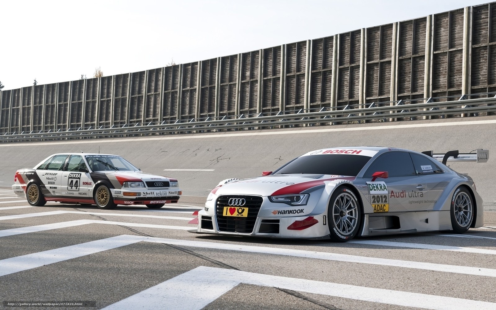Audi race cars on track