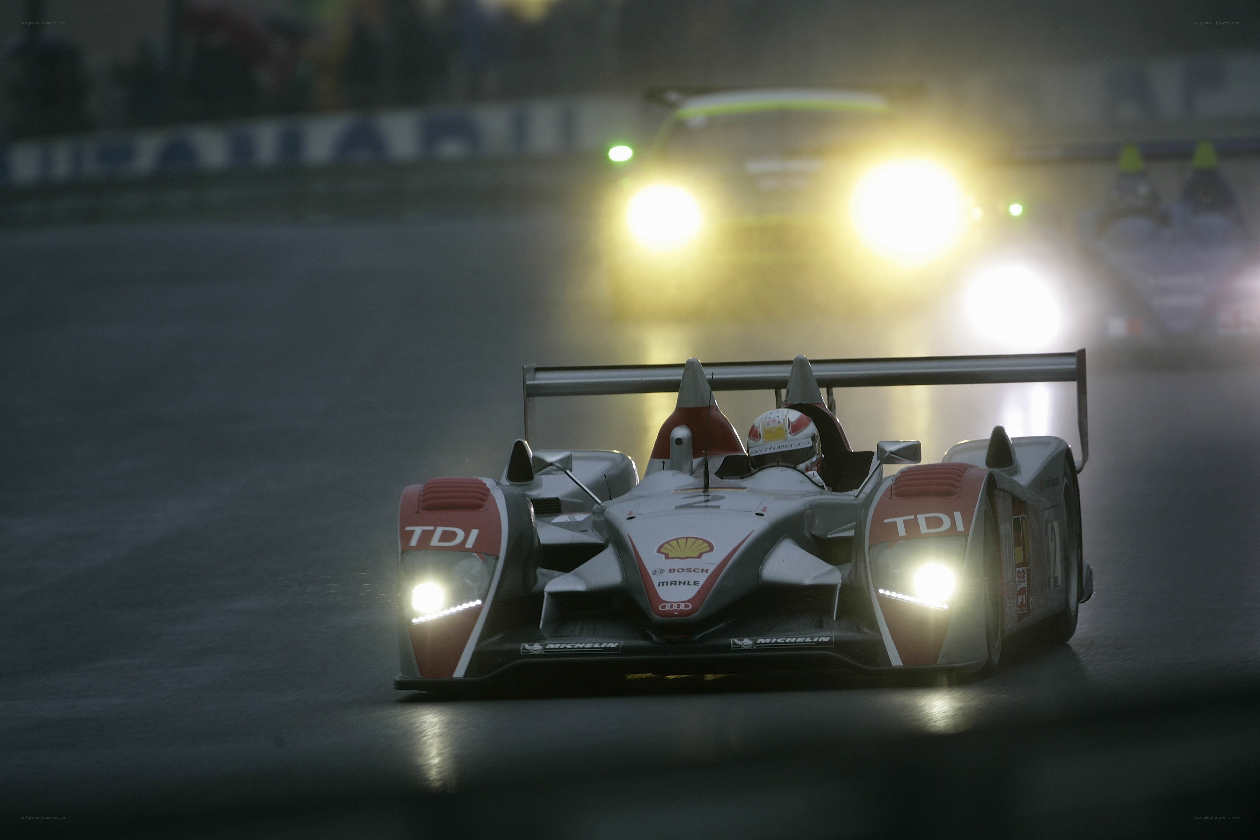 Audi racing car on a wet track