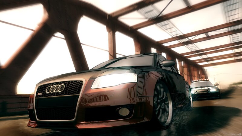 Audi racing under a bridge