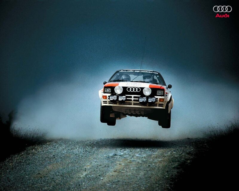 Audi rally car in mid-air jump