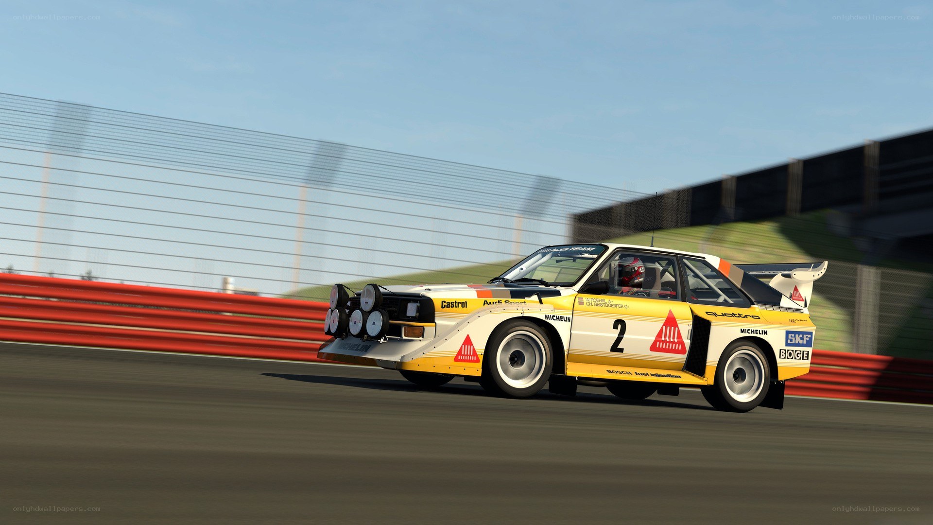 Audi rally car on a racetrack
