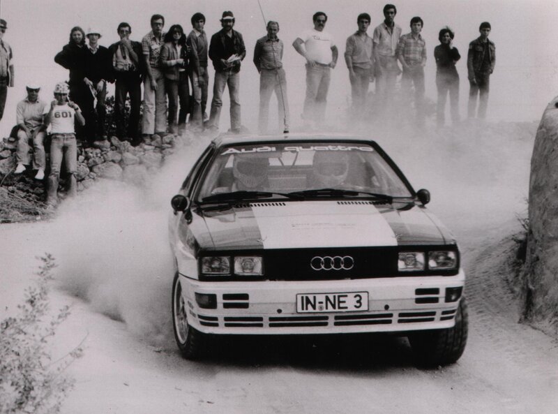 Audi rally car on dusty road