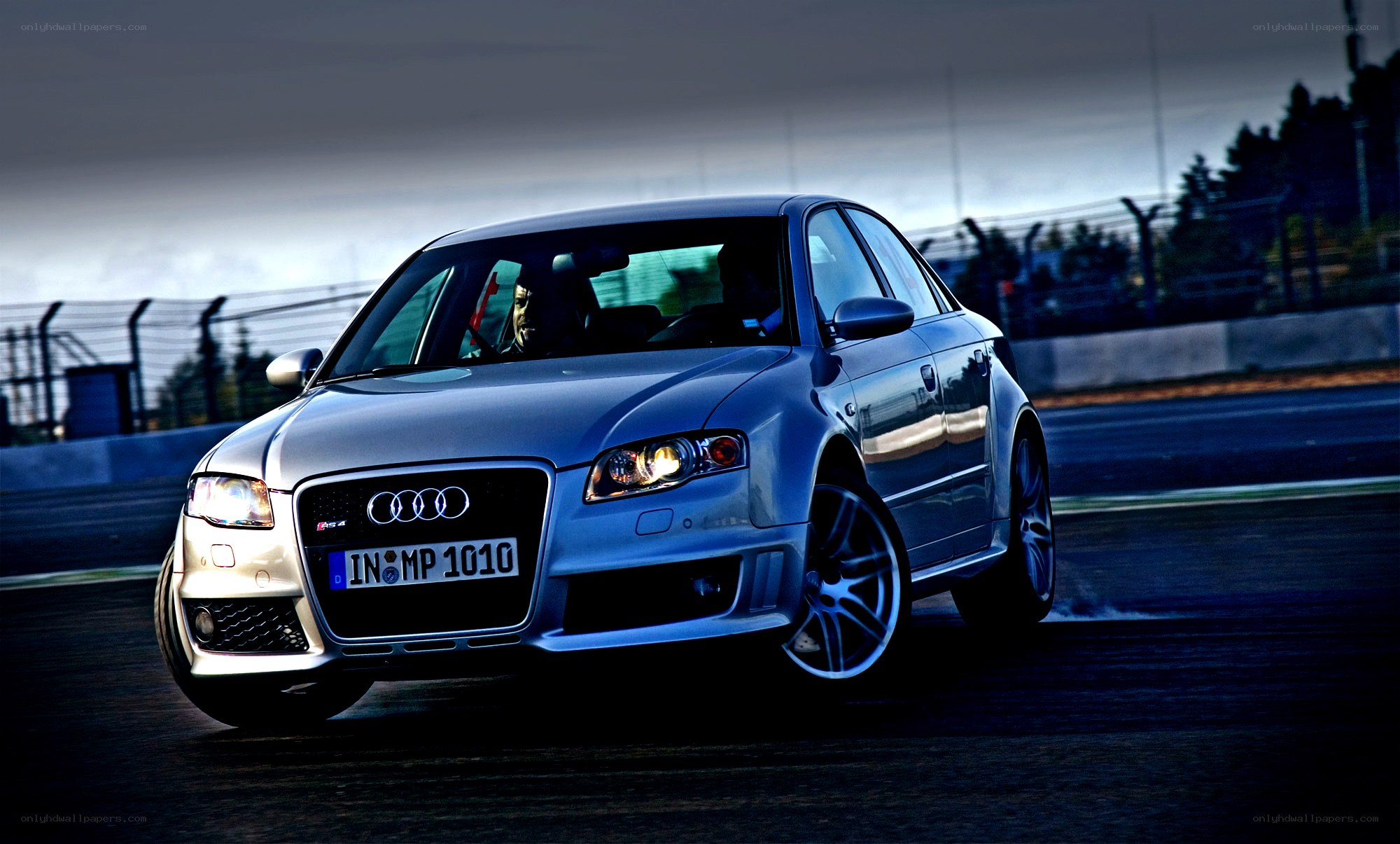 Audi RS4 on a racetrack