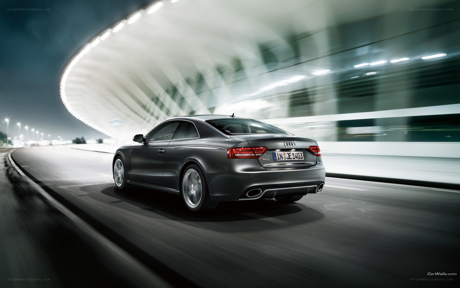 Audi RS5 in motion at night