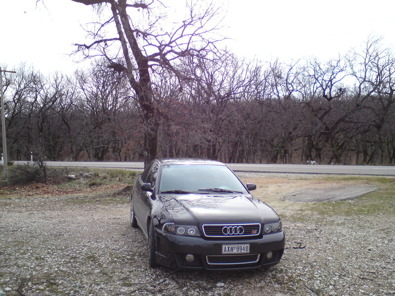 Audi S4 parked on gravel