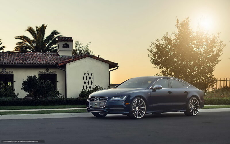 Audi S7 parked in front of a house