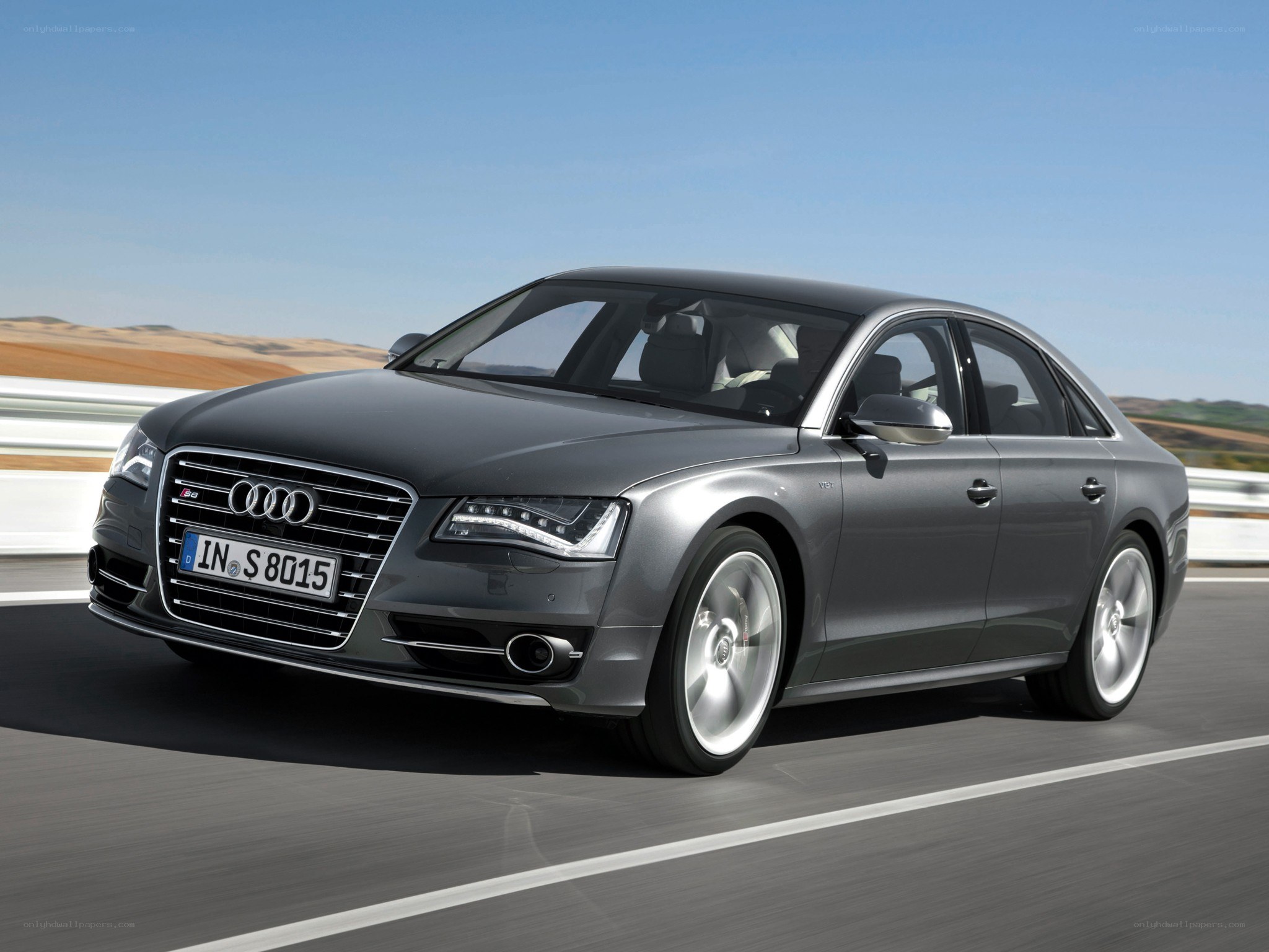 Audi S8 driving on a road