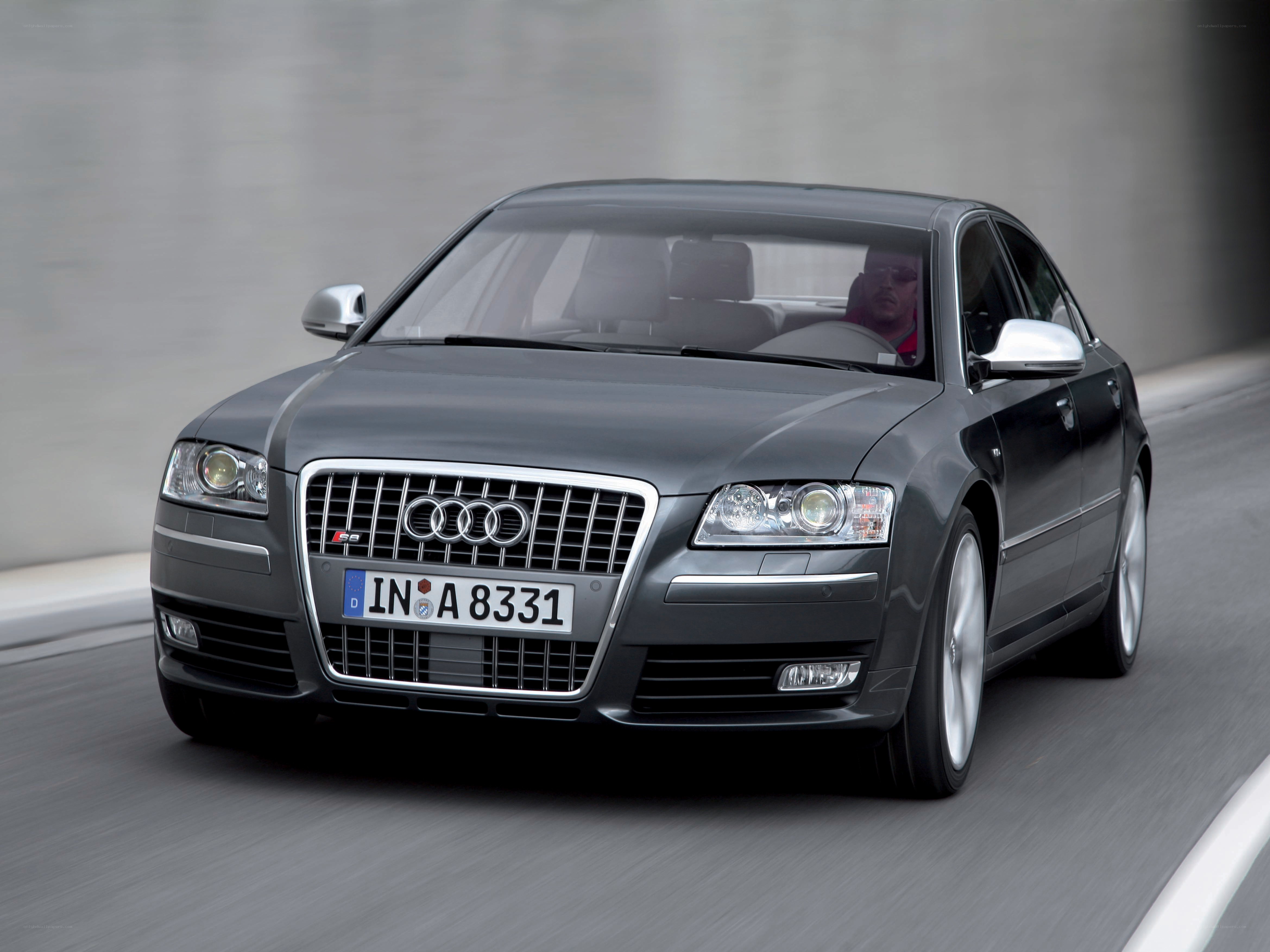 Audi S8 driving on a road