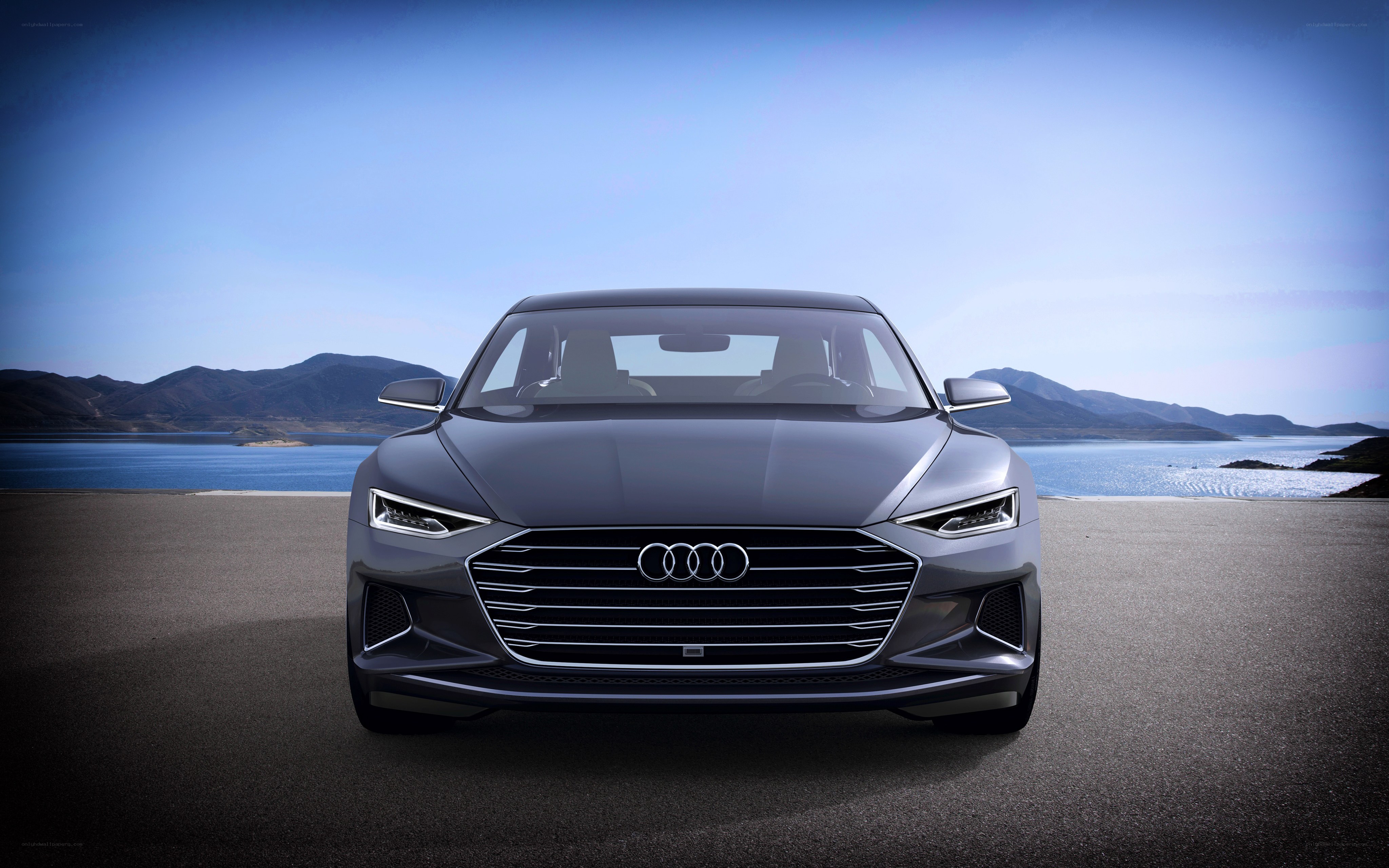 Audi sedan by the water