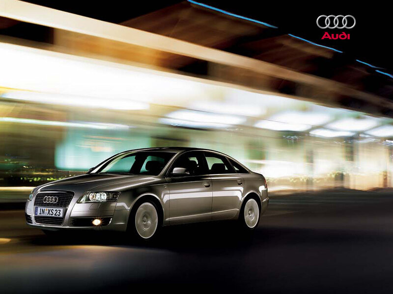 Audi sedan in motion at night