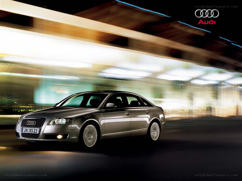 Audi sedan in motion at night
