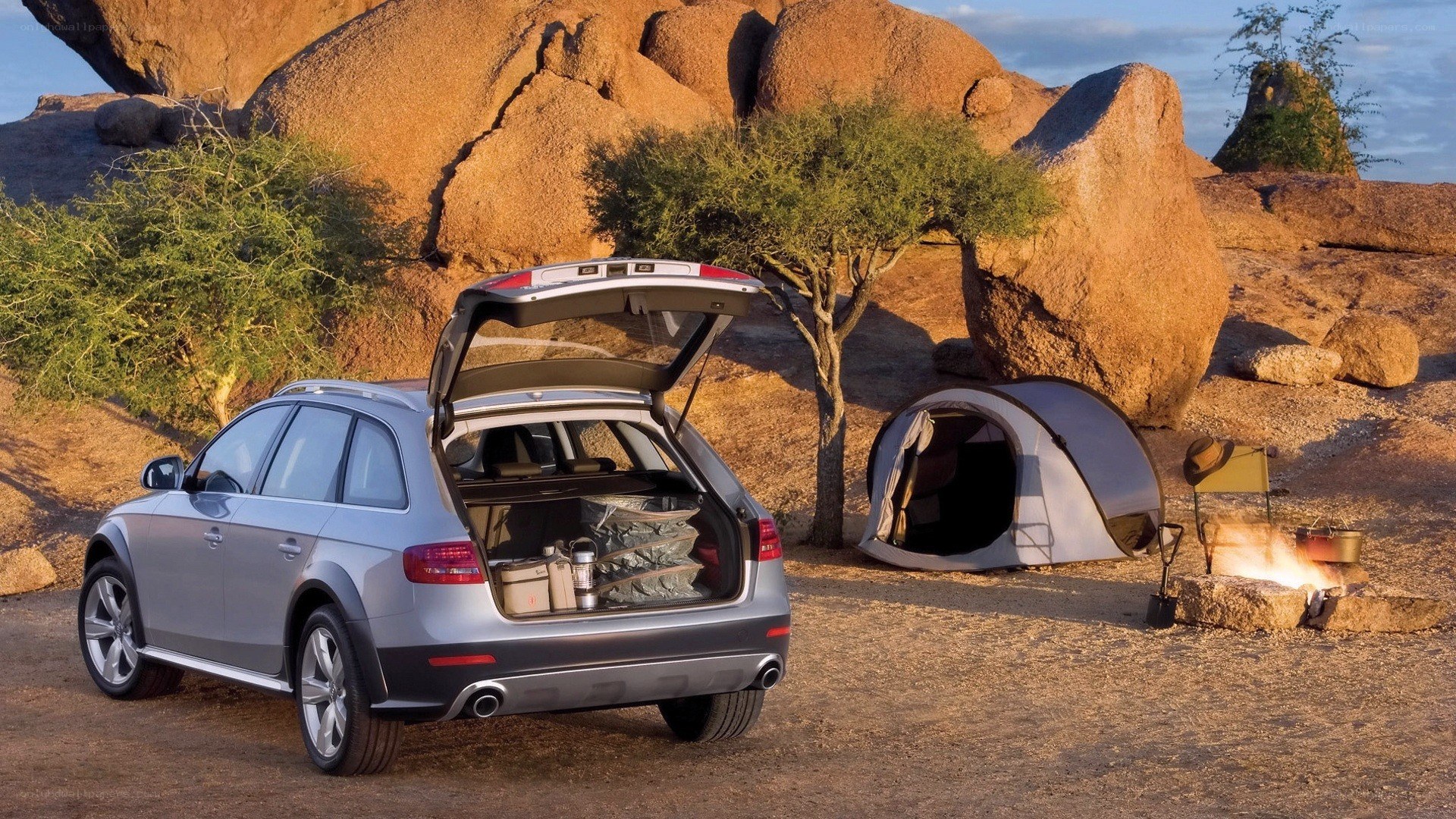 Audi station wagon at campsite