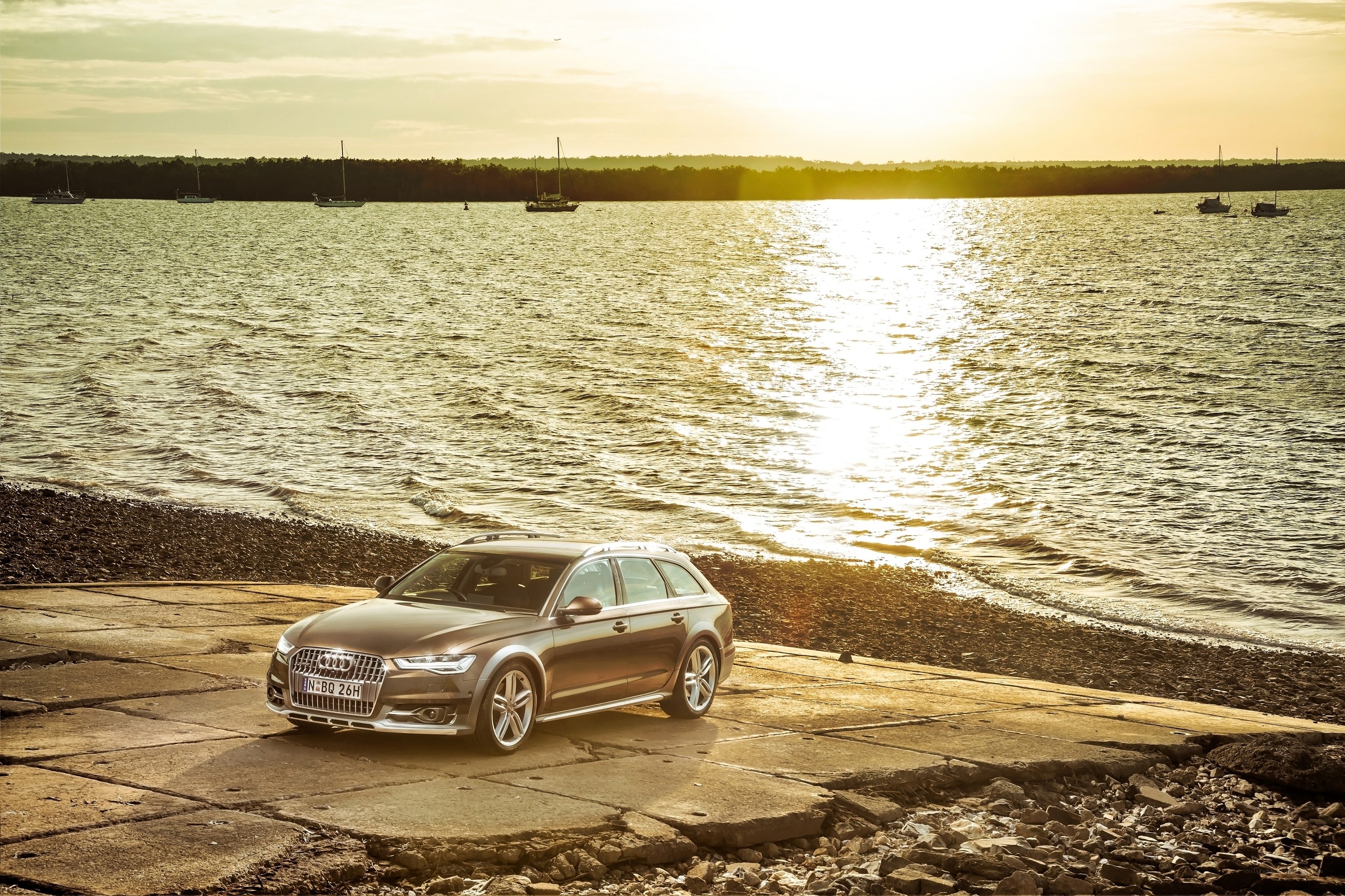 Audi station wagon by the water