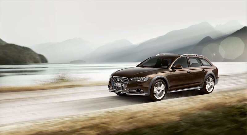 Audi station wagon on a scenic road