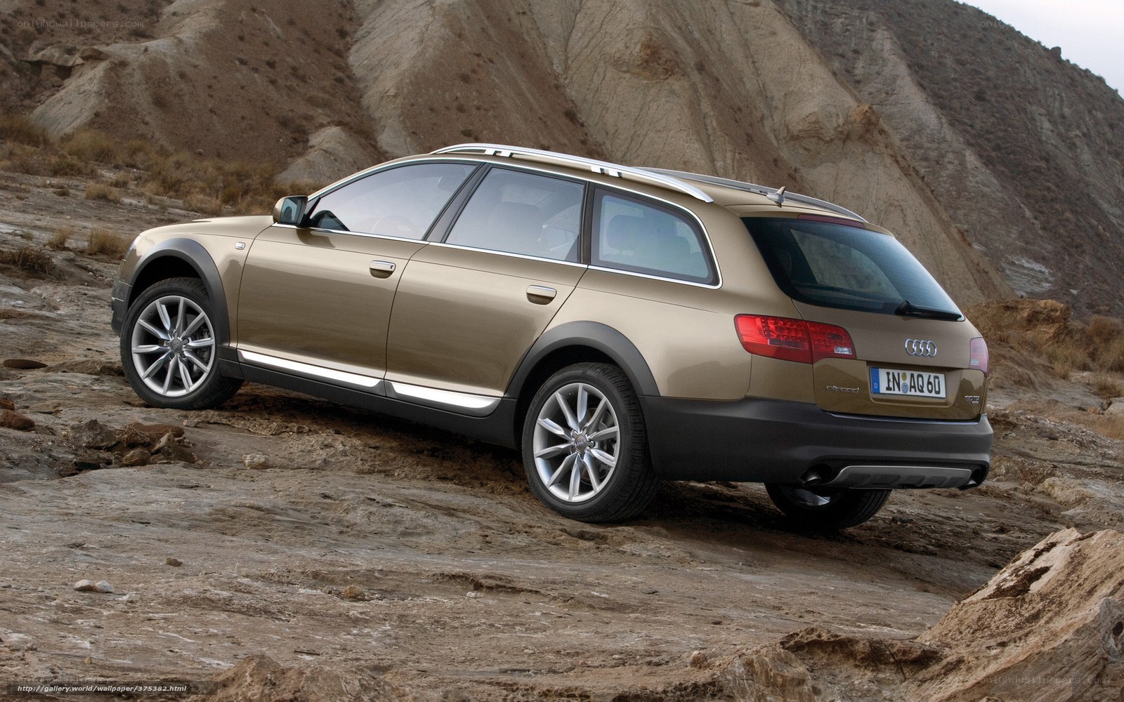 Audi station wagon on rugged terrain