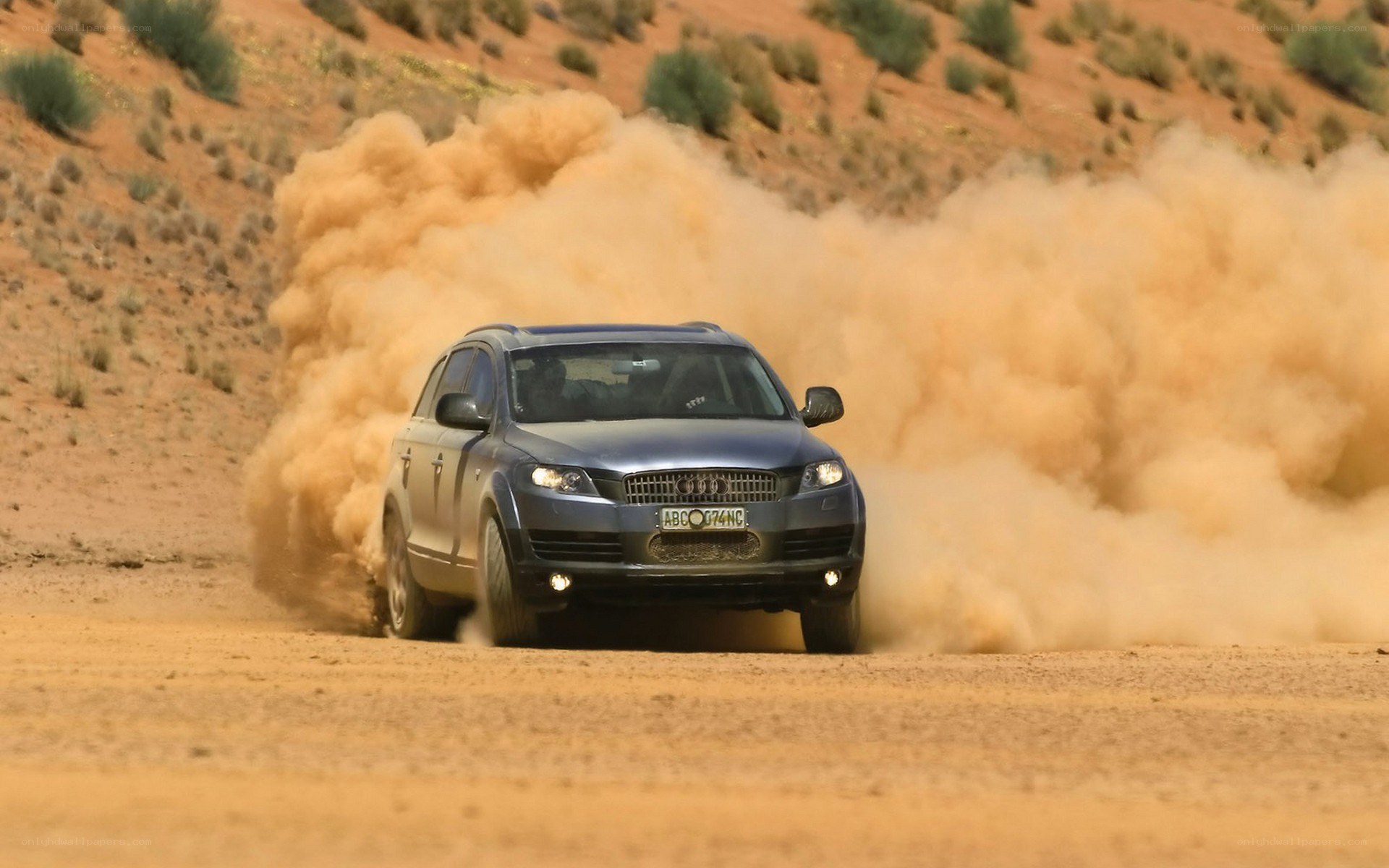 Audi SUV kicking up dust
