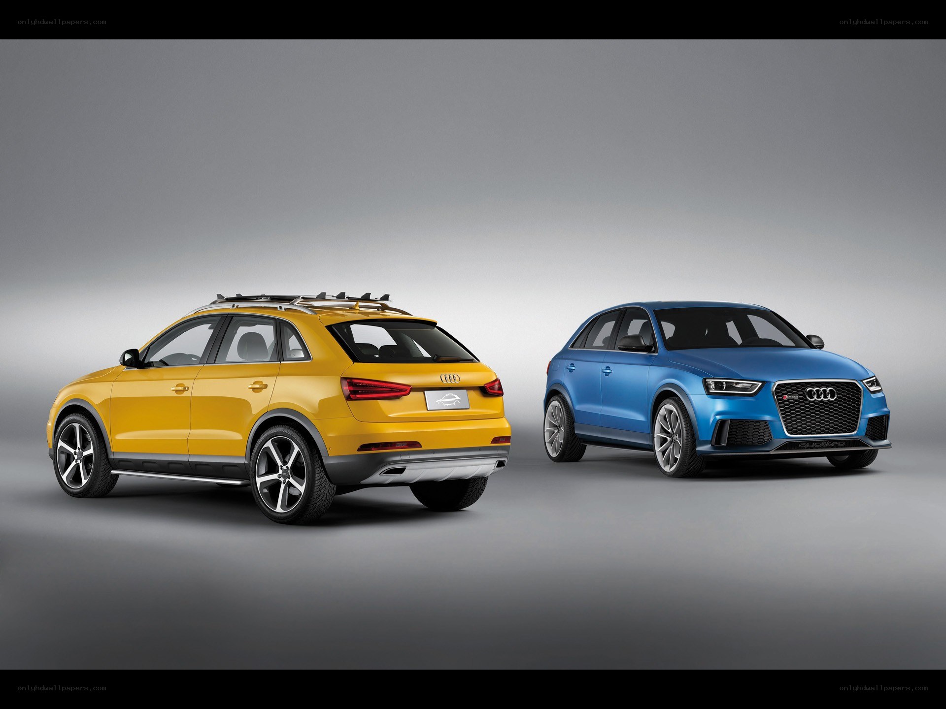 Audi SUVs in yellow and blue