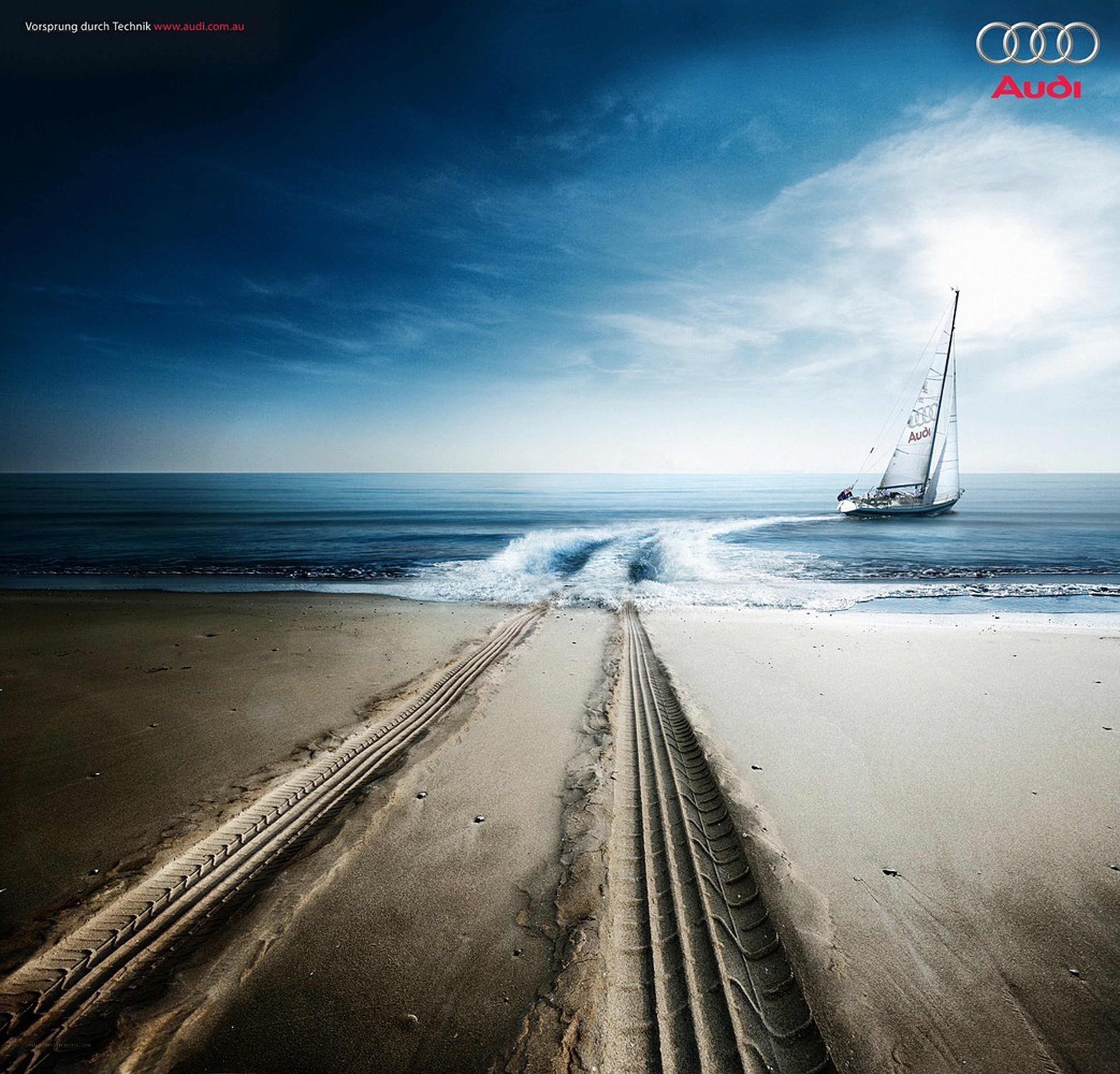 Audi tire tracks on beach