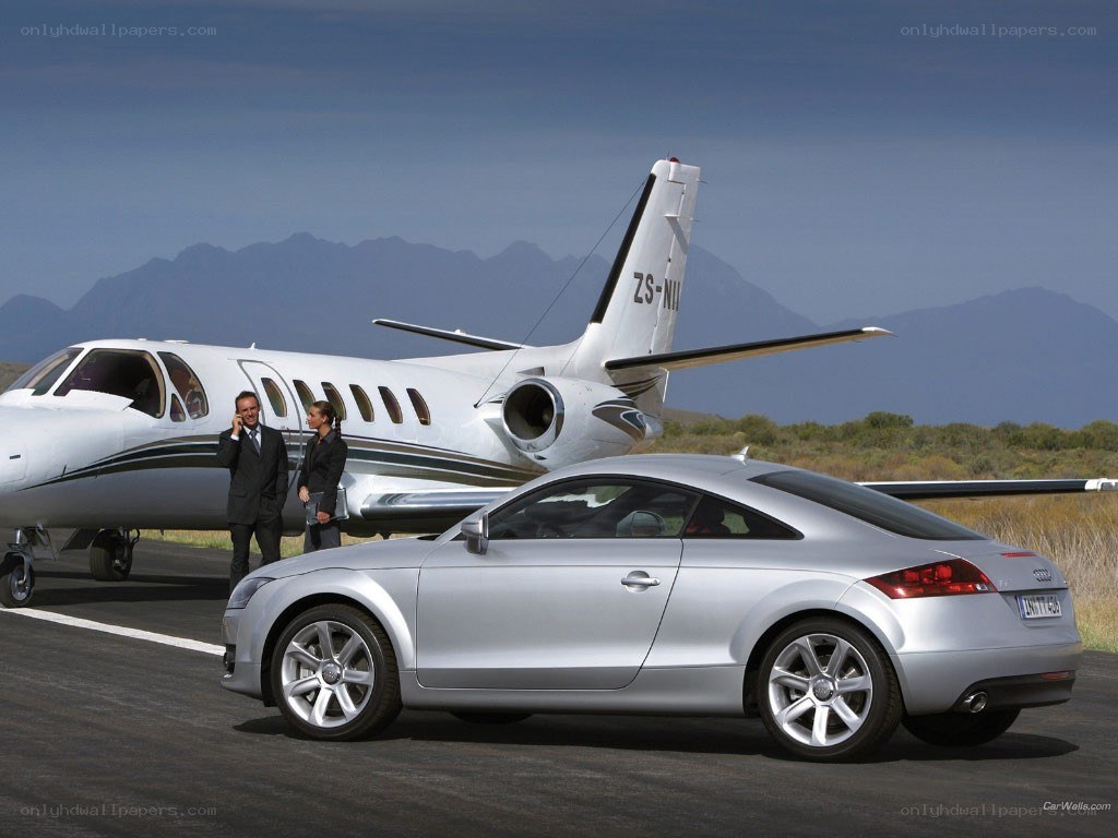 Audi TT and private jet