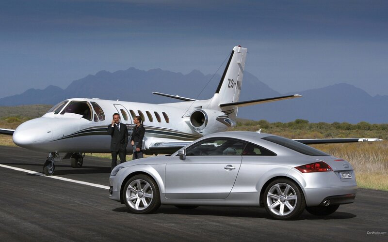 Audi TT and private jet