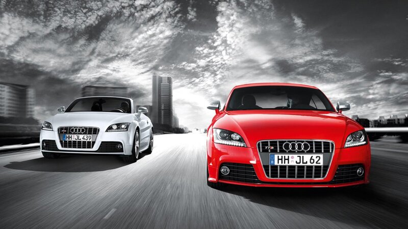 Audi TT cars on city road