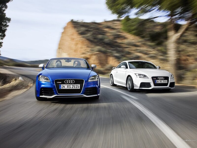 Audi TT RS cars on a road