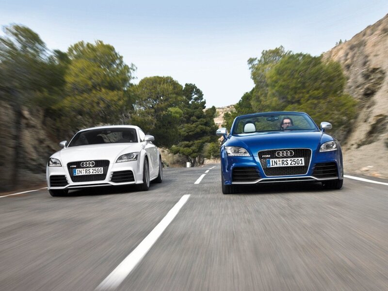 Audi TT RS cars on a road