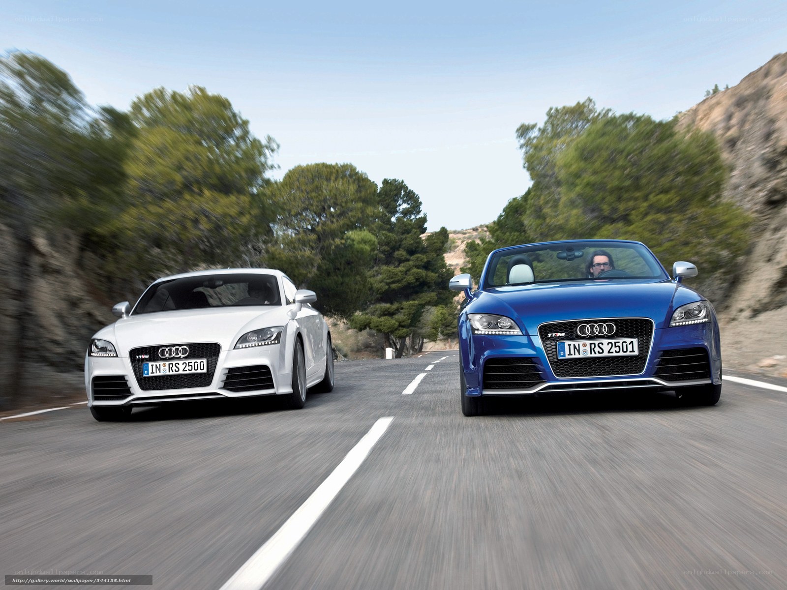Audi TT RS cars on a road