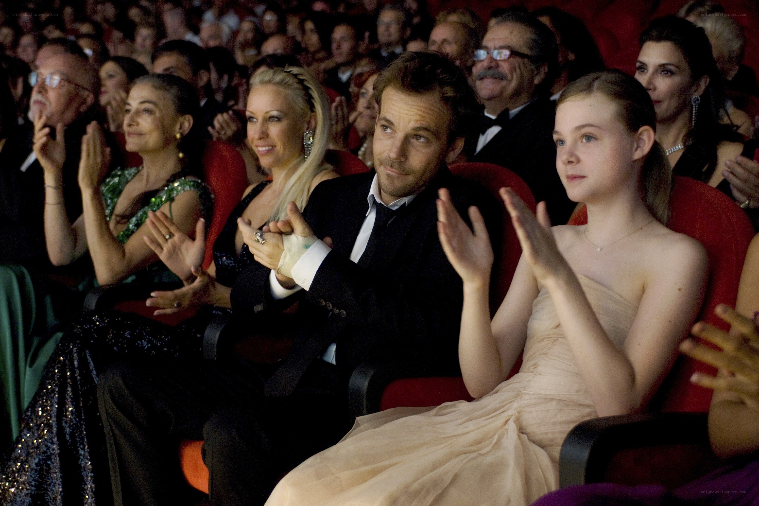Audience clapping at event