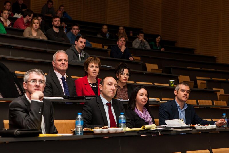 Audience in Lecture Hall — Black