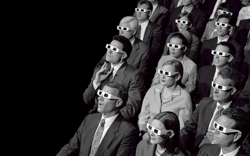 Audience wearing 3D glasses
