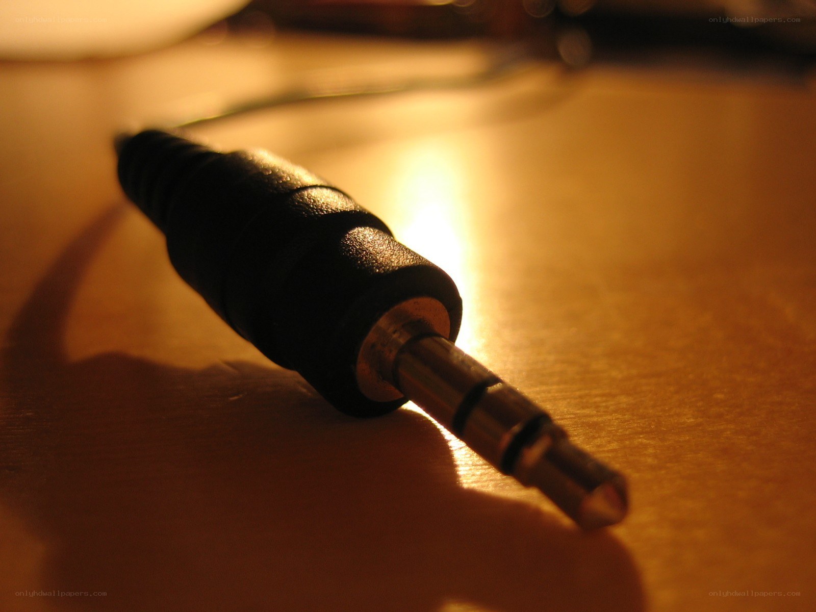 audio jack on wooden surface