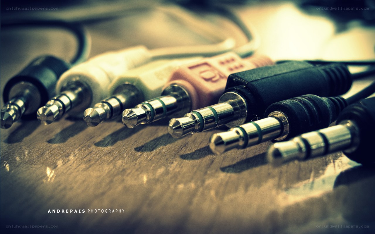 audio jacks on wooden surface