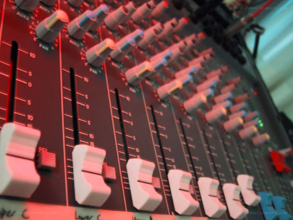Audio mixer with faders and knobs