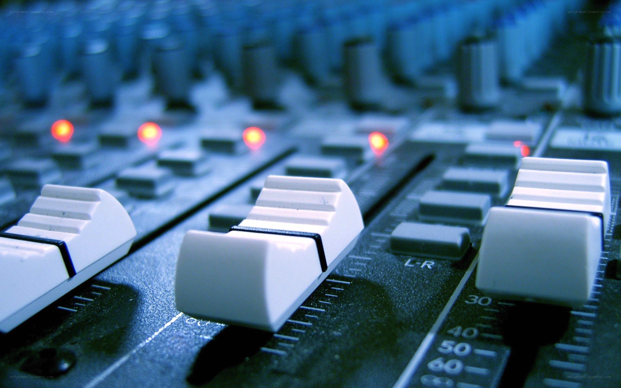 Audio mixer with faders and lights