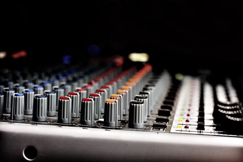 Audio mixer with knobs and faders