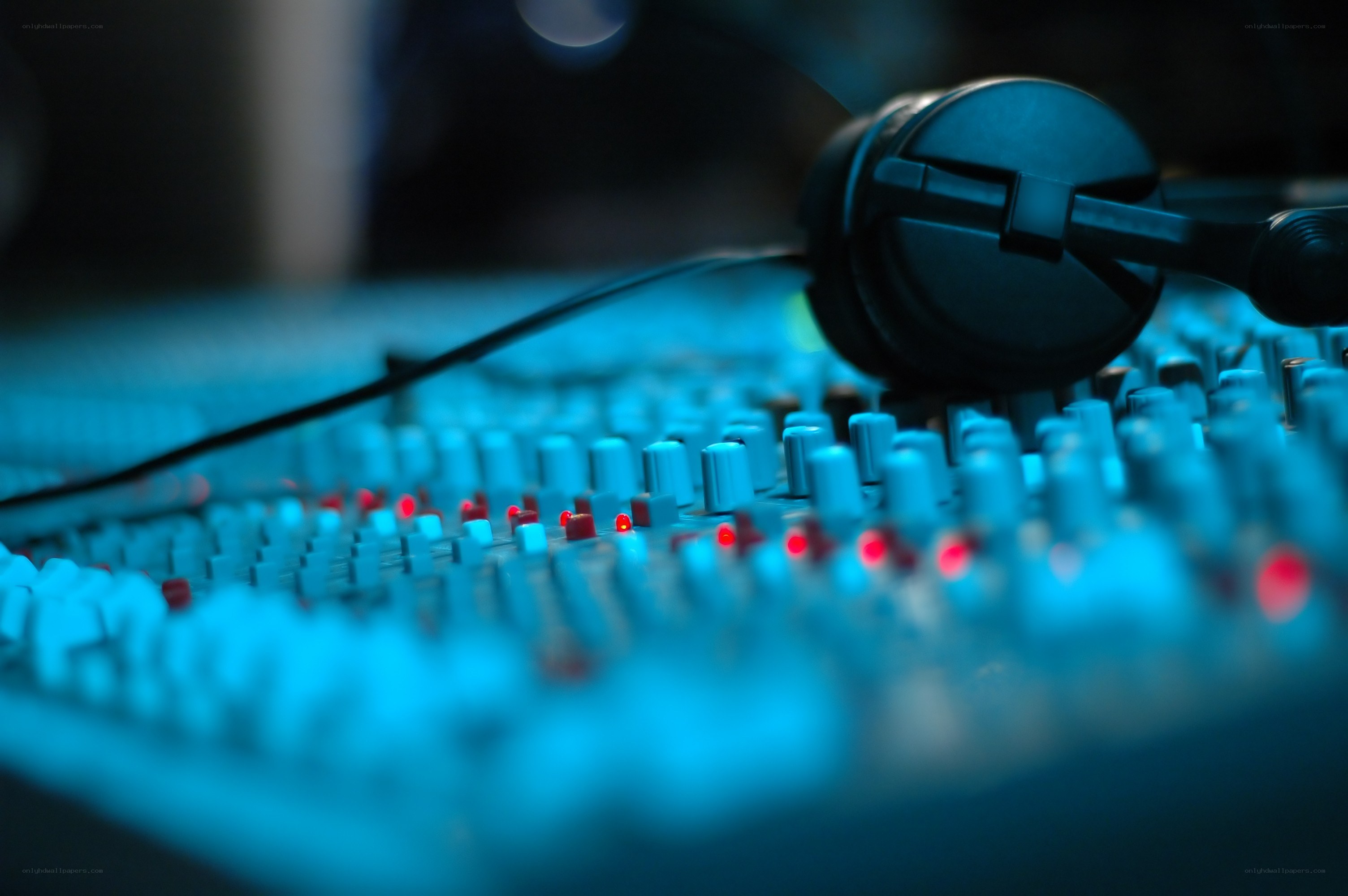 Audio mixing console with headphones