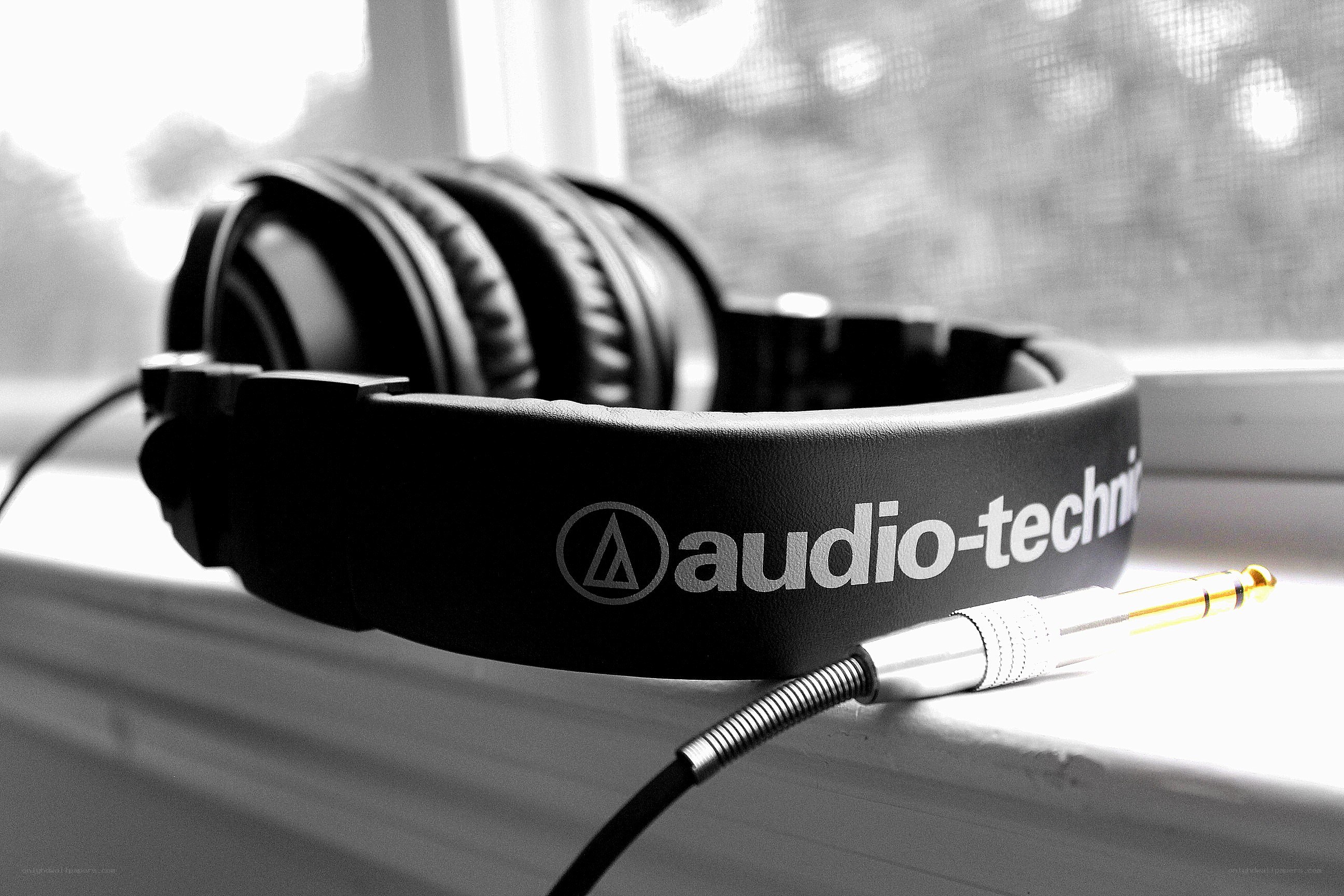 Audio-Technica headphones on windowsill