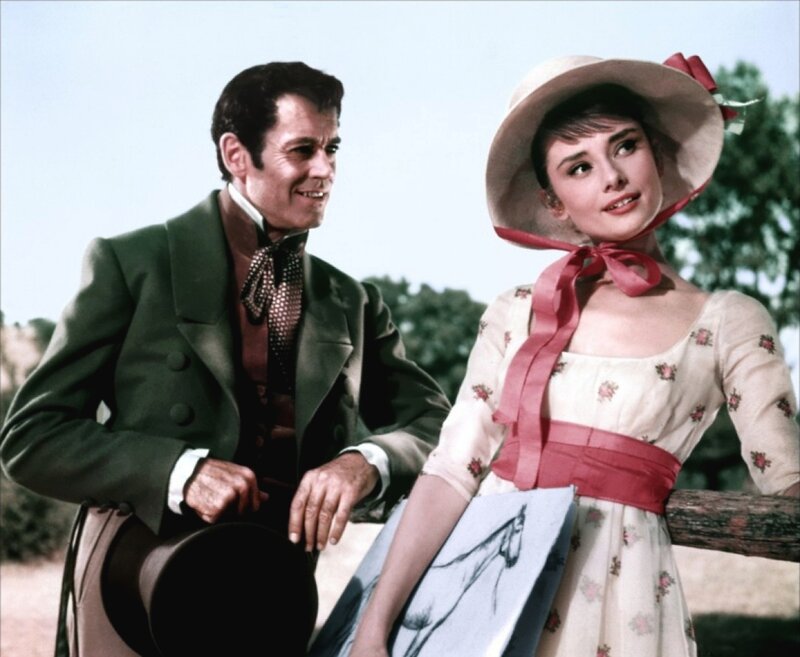 Audrey Hepburn and a man in period attire