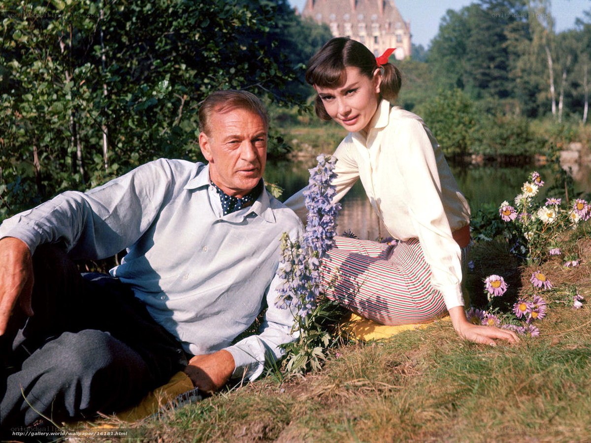 Audrey Hepburn and William Holden in a garden